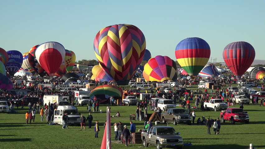 ALBUQUERQUE, NEW MEXICO - OCT 2014: Albuquerque Balloon Fiesta setting up to fly. Began in 1972 with 13 hot air balloons. Now 600 balloons from 20 different countries and is the world