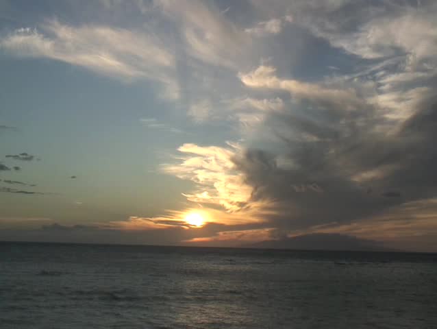 Amazing sunset on the beach in Maui.
