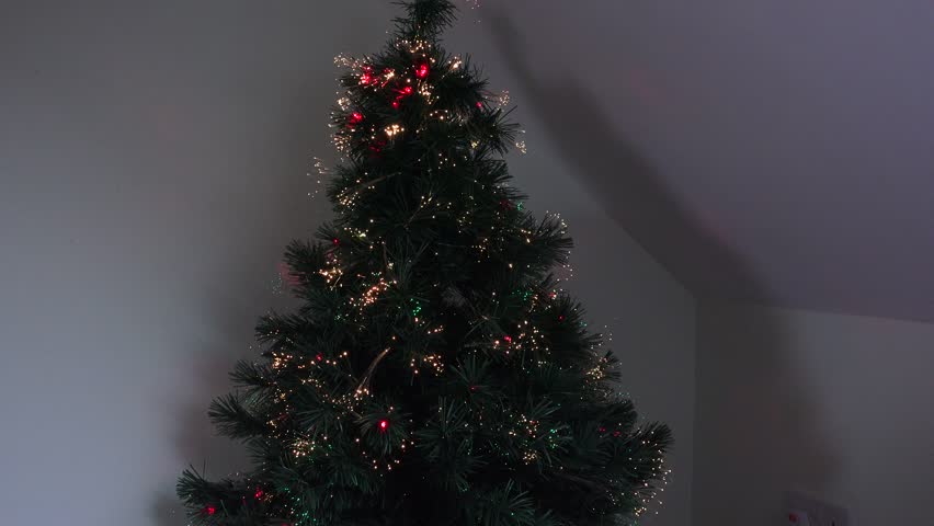 4k Christmas tree with lights flashing - Powered by Shutterstock - Get 15% off with code: PIKWIZARD15