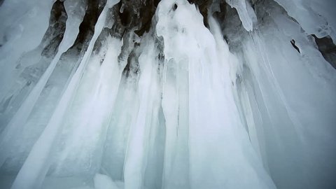 Icicle (Stalactite) Hanging Inside the Rocky Caves, panoramic view, Lake Baikal