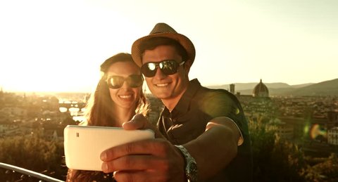 Attractive Young Couple on vacation Europe Taking Selfie Happy Technology