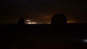 Monument Valley Lightning 02 Tilt Up Time Lapse Night Sky - Powered by Shutterstock - Get 15% off with code: PIKWIZARD15