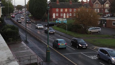 Lichfield, UK - 6 October, 2014 Traffic Cars Stop at Rush Hour Road Pedestrian Crossing Lights Rainy Wet Day- Lichfield, UK - October 2014

Location: Lichfield, Staffordshire, England, UK

Source: Canon 5DMkiii