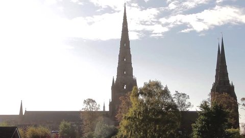 Epic Sun Lens Flare Over Spires Lichfield Cathedral Beautiful Morning Light Big Blue Sky High Angle Rooftop View - October, 2014

Location: Lichfield, Staffordshire, England, UK

Source: Canon 5DMkiii