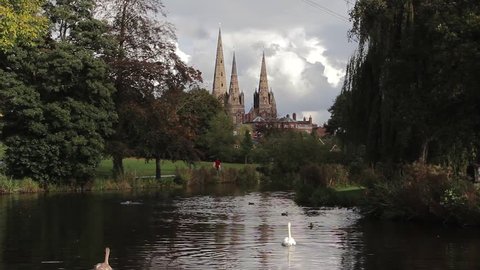 Historic Lichfield Cathedral Beautiful View Across Park River with Family of Ducks and Swans - October, UK

Location: Lichfield, Staffordshire, England, UK

Source: Canon 5DMkiii