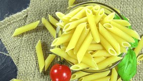 Portion of raw Penne as seamless loopable 4K footage