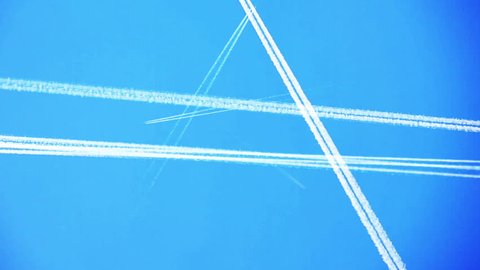 Many Airplanes flying at cruising altitude, condense trails remaining. Aka contrails or chemtrails.
