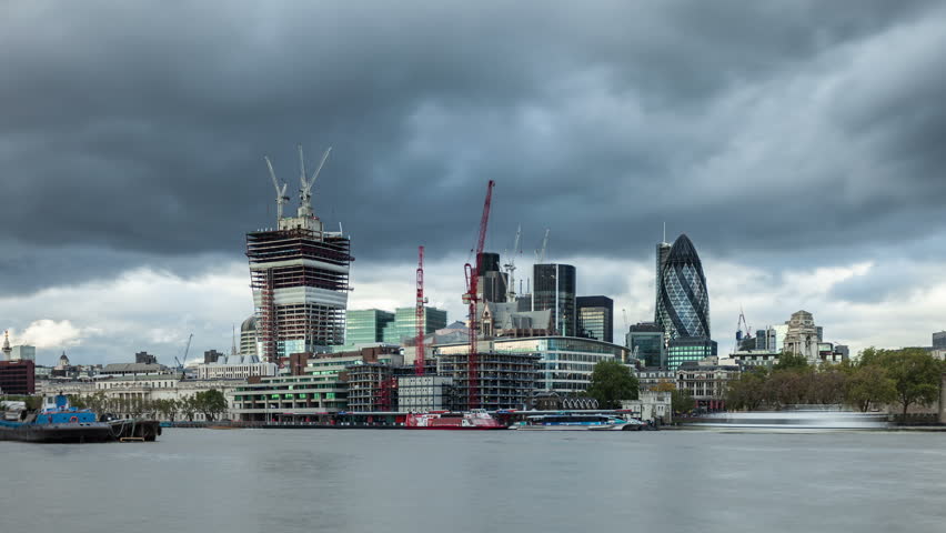 Time Lapse of view of the construction of the business centre of London. 30 St Mary Axe (the Gherkin) and construction of 20 Fenchurch Street, UK  Royalty-Free Stock Footage #7643416