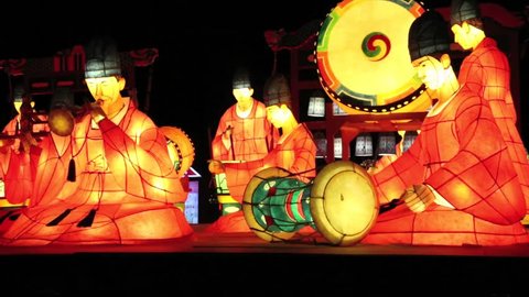 Taipei, Taiwan-24 February, 2013: Light up celebrating lantern festival, Musicians in traditional costume lanterns in the Taipei Light Festival-Dan