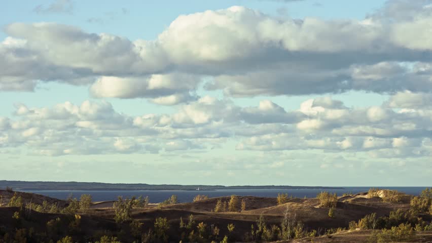 Timelapse of clouds over Sleeping Bear Dunes and Lake Michigan. Shot in the evening in 4K on a Panasonic GH4. 