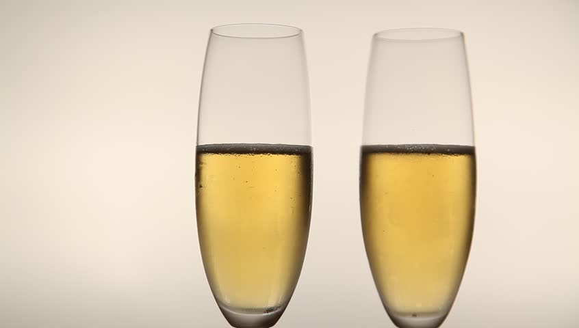 Two Glases with Sparkling Champagne Toasting