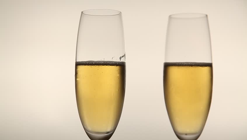 Two Glases with Sparkling Champagne Toasting