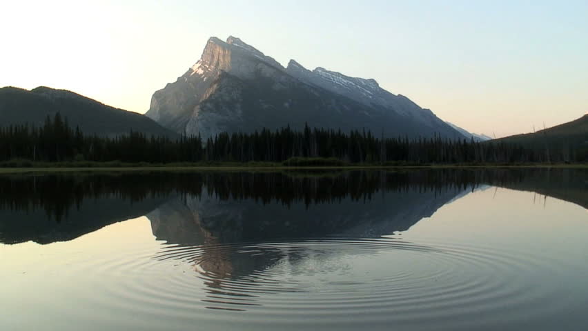 Banff National Park Vermillion Lake Mountains and clouds reflecting in lake