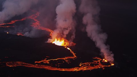 Aerial night volcano lava Holuhraun magma land fissures seismic activity hydrothermal heat steam gas cloud Iceland RED EPIC Stockvideo