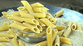 Wholemeal Penne as seamless loopable 4K footage