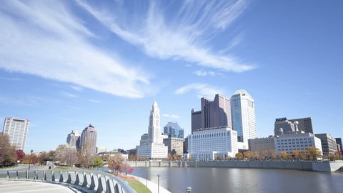 COLUMBUS, USA - NOV 9, 2011: 4K Time lapse zoom out of Columbus skyline and the Scioto River at daytime. Columbus is the capital of Ohio