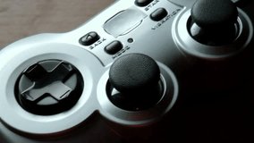 The video shows clousup game controller - Powered by Shutterstock - Get 15% off with code: PIKWIZARD15