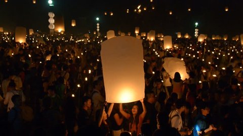  CHIANGMAI THAILAND OCTOBER 25 :Unidentified Tourists visit the day of Yeepeng Sansai Floating Lantern Ceremony to pay Homage to the Lord Buddha and Release lantern to the sky on October 25 , 2014.
