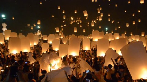  CHIANGMAI THAILAND OCTOBER 25 :Unidentified Tourists visit the day of Yeepeng Sansai Floating Lantern Ceremony to pay Homage to the Lord Buddha and Release lantern to the sky on October 25 , 2014.
