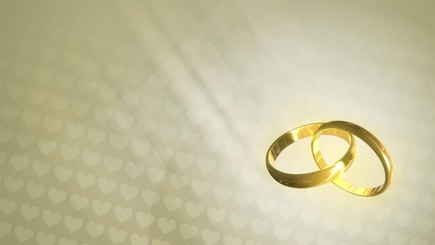Loopable animated background of three-dimensional wedding rings revolving over a