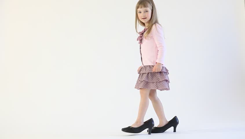 little girl in big shoes