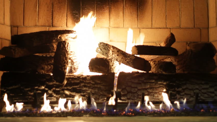 a fireplace glowing warmly in the winter