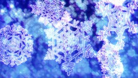 Big Christmas snowflakes loop with sparkly defocused snow or glitter background. Dark blue version. In 4K Ultra HD, HD 1080p and smaller sizes.