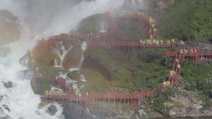 Wooden walkways comprise part of the "Cave of the Winds" tour.  Base of Niagara Falls on the American side.  Niagara Falls, New York.