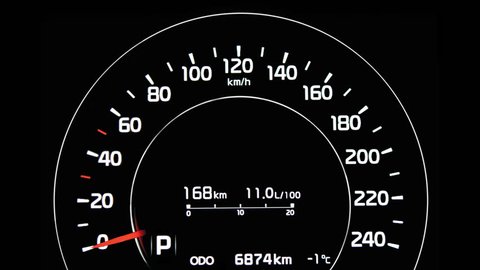 Digital speedometer of car driving with acceleration, indicator needle up to 240 km/h, blur