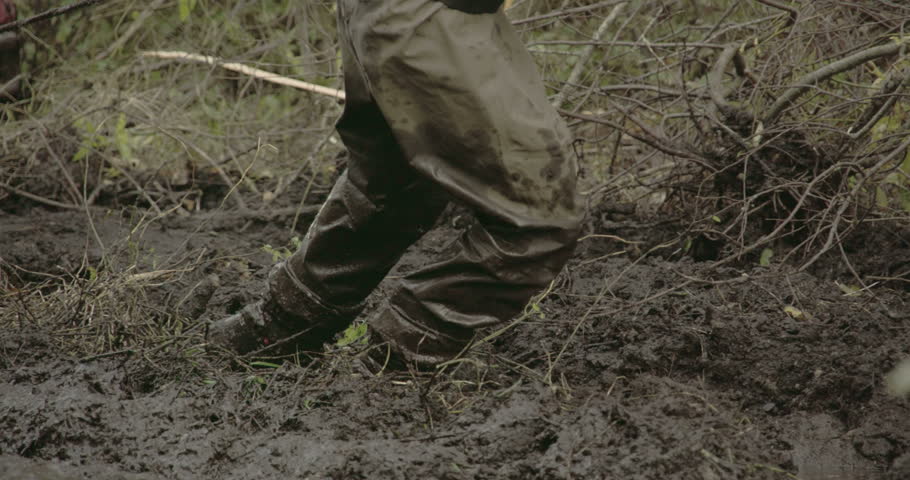 man boots walking onto thick mud Stock Footage Video (100% Royalty-free ...