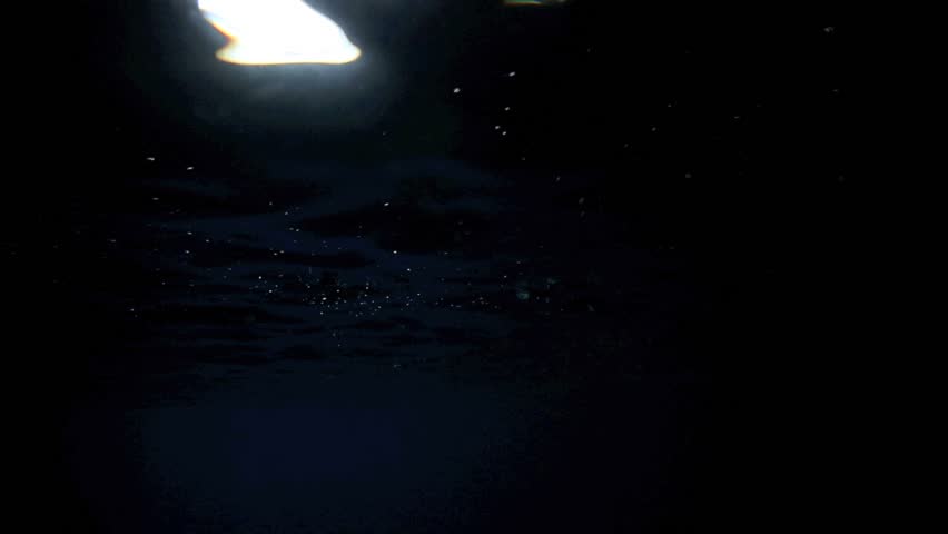 Light reflecting on ocean surface in underwater sea cave | Shutterstock HD Video #7751086