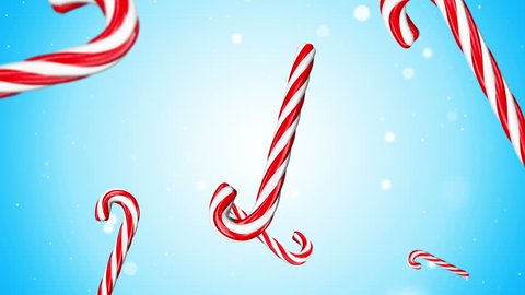 Rotation and falling Christmas and New Year Candy Cane on colorfull background with shine and glow particles. Loop animation