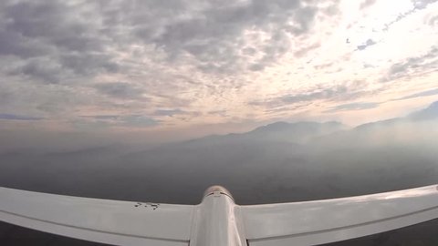 Sail plane, glider high in the clouds, Camera mounted on the elevator, with sound of the wind, 1080p, full HD