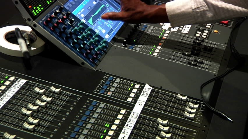 A professional audio mixer board.
