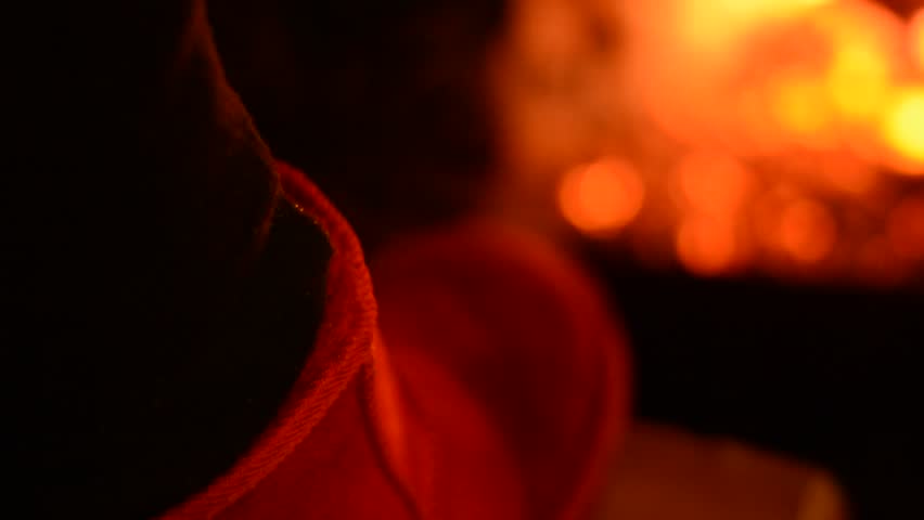 steam rises from the shoes near the fireplace