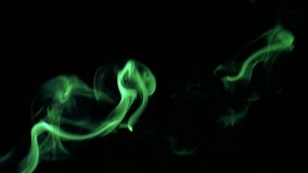 The video shows green Smoke on a black background