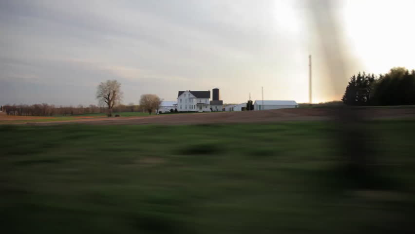 Driving shots of countryside landscapes.