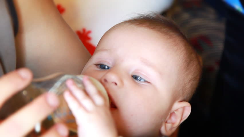 Little baby drinking, close up