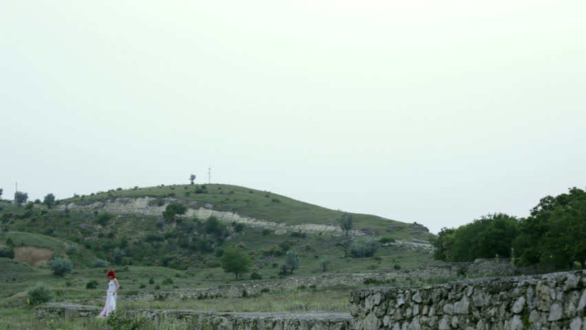 Girl running in the middle of nature