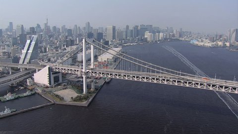 Aerial Bay view commercial docks vessels Rainbow Bridge northern Odaiba District Tokyo City Shuto Expressway Japan Asia