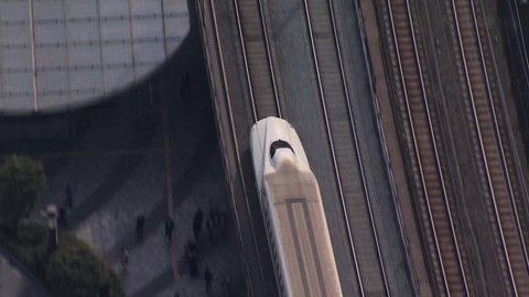 Aerial Shinkansen TGV high speed Bullet train in motion Tokyo city population Japanese Railway Asia