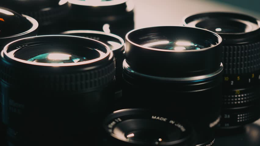 Dolly shot of photographic lenses