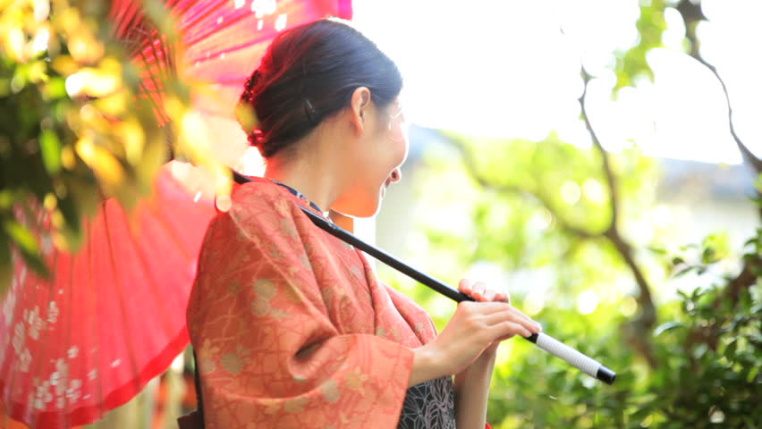 Female Asian Japanese girl silk national costume kimono parasol business advertising Japan travel tourism natural gardens