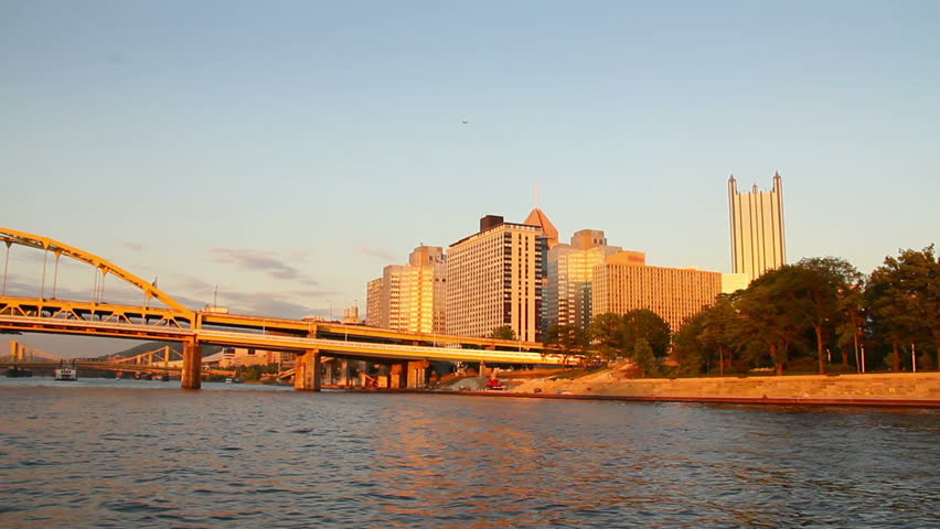 The skyline of Pittsburgh, Pennsylvania as seen from the river at dusk.