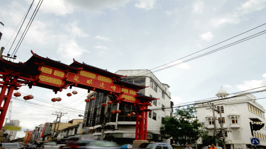 china town in Chiang Mai Thailand  time lapse of traffic and clouds 