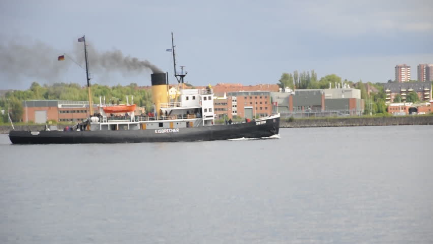 Steamship is passing by in the harbor of Kiel, Germany