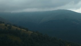 4K Timelapse of storm clouds in mountains (ultra-high definition (UHD, 4096x2304)). Video without birds and defects