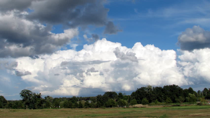 Time lapse sequence of a morphing cumulonimbus storm going away