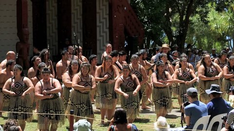 WAITANGI, NEW ZEALAND - FEB 06: Maori men and women performing kapa haka on February, 2013 in Waitangi, New Zealand