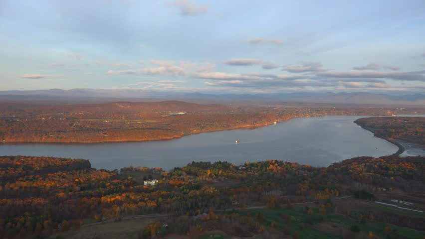 Hudson River aerial looking North toward Kingston. Late fall in the Hudson Valley, 4K, UHD aerials, and organic clouds in early morning, clear light.
